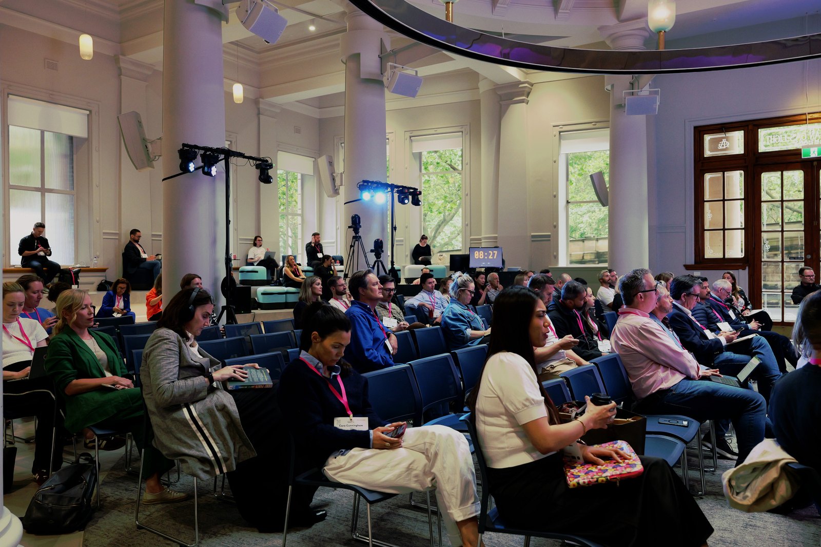 Wide view of the seated audience