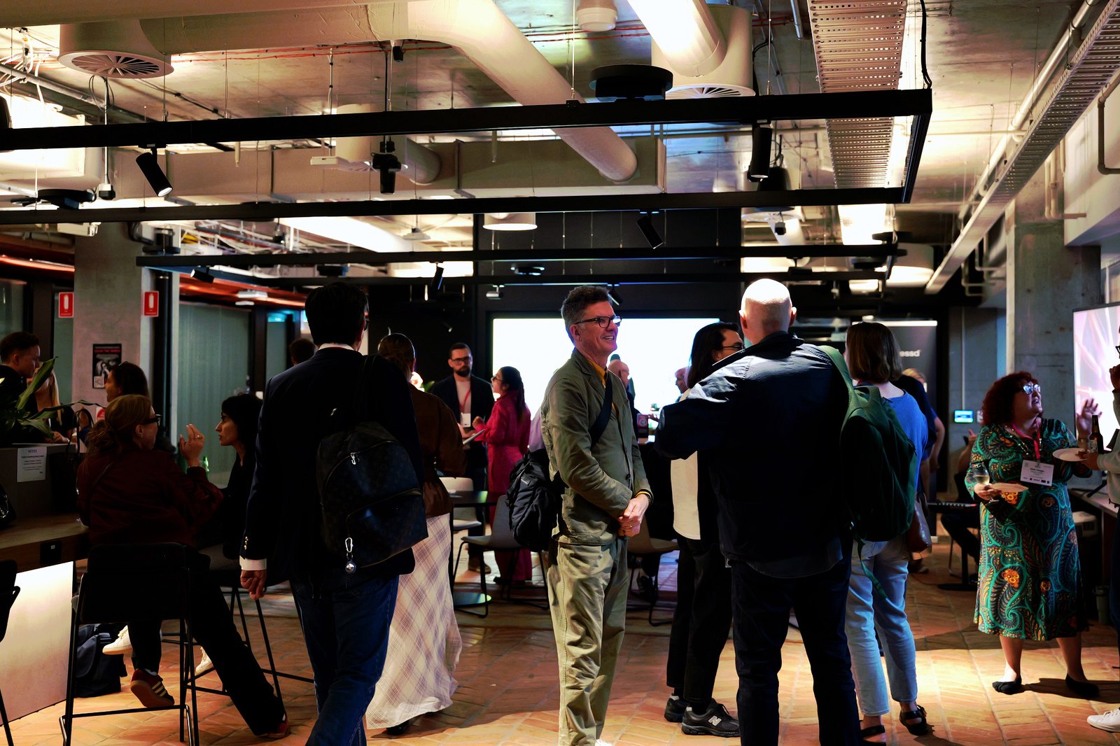 Delegates networking with drinks